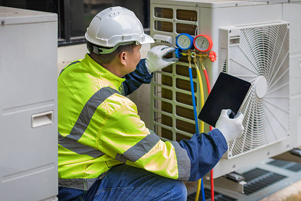 Professional Air Conditioning Repair technician working in Manasquan, NJ